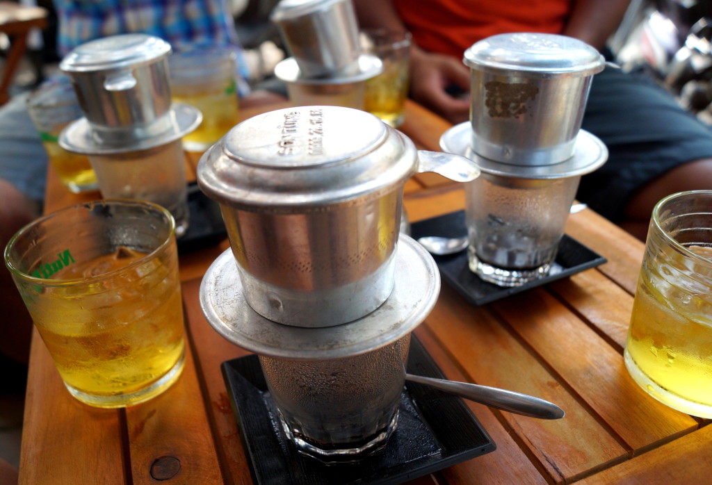 Vietnamese coffee often comes with a complimentary cup of tea. (Photo by Kirsten Koza, Writers' Expeditions)