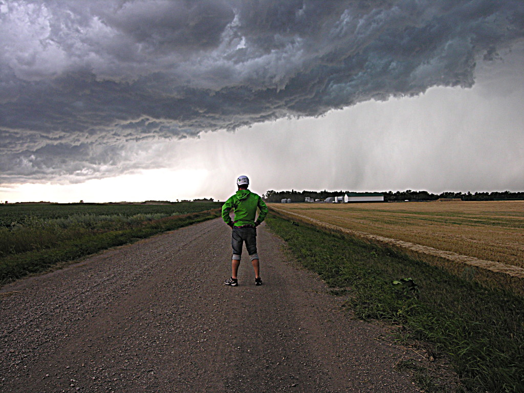 Wong He, in North Dakota, wearing his helmet he'd brought from China. (Photo by Kirsten Koza)