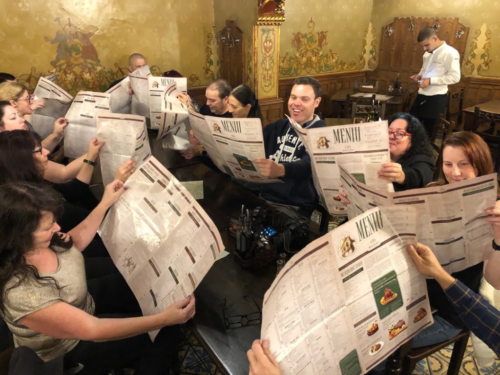 2019's Vlad Dracula Expedition participants peruse the menus at The Beer Chariot. (Photo by Christopher Campbell)